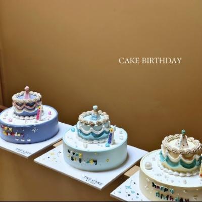 Row of mini birthday cakes