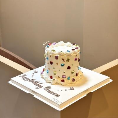 Facebook post: Happy Birthday Queen cake